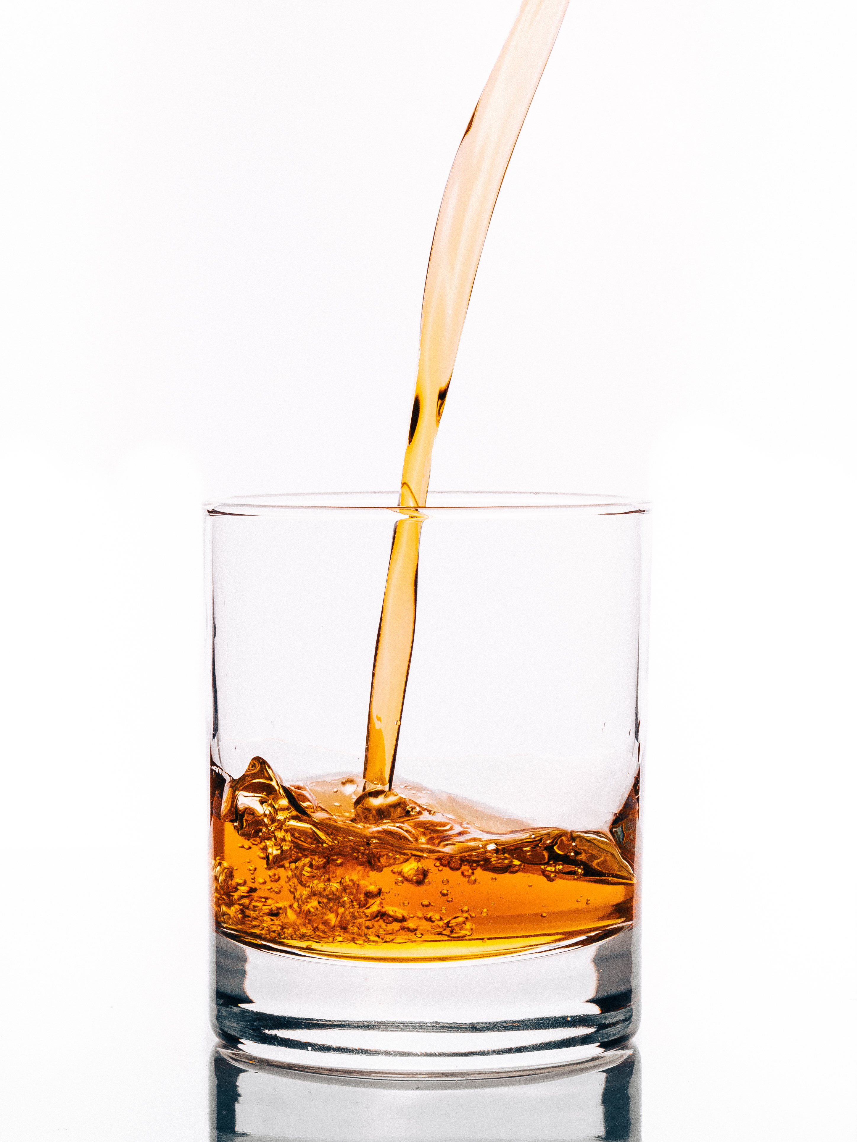 Pouring Welsh Whiskey into a glass