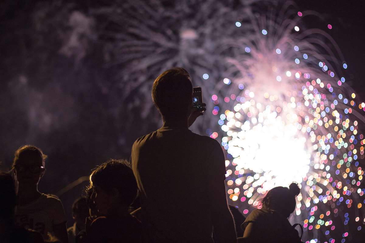 Crowd watching fireworks display in Pembrokeshire