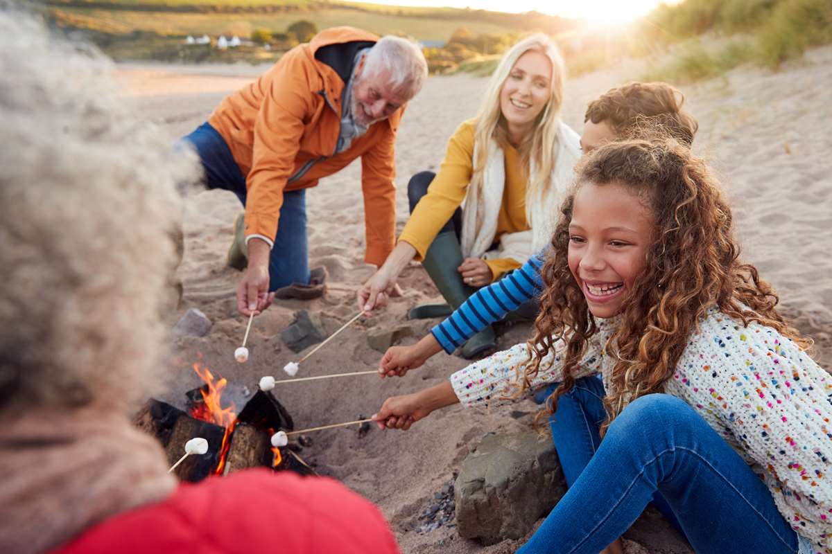 A family enjoying a holiday on the beach