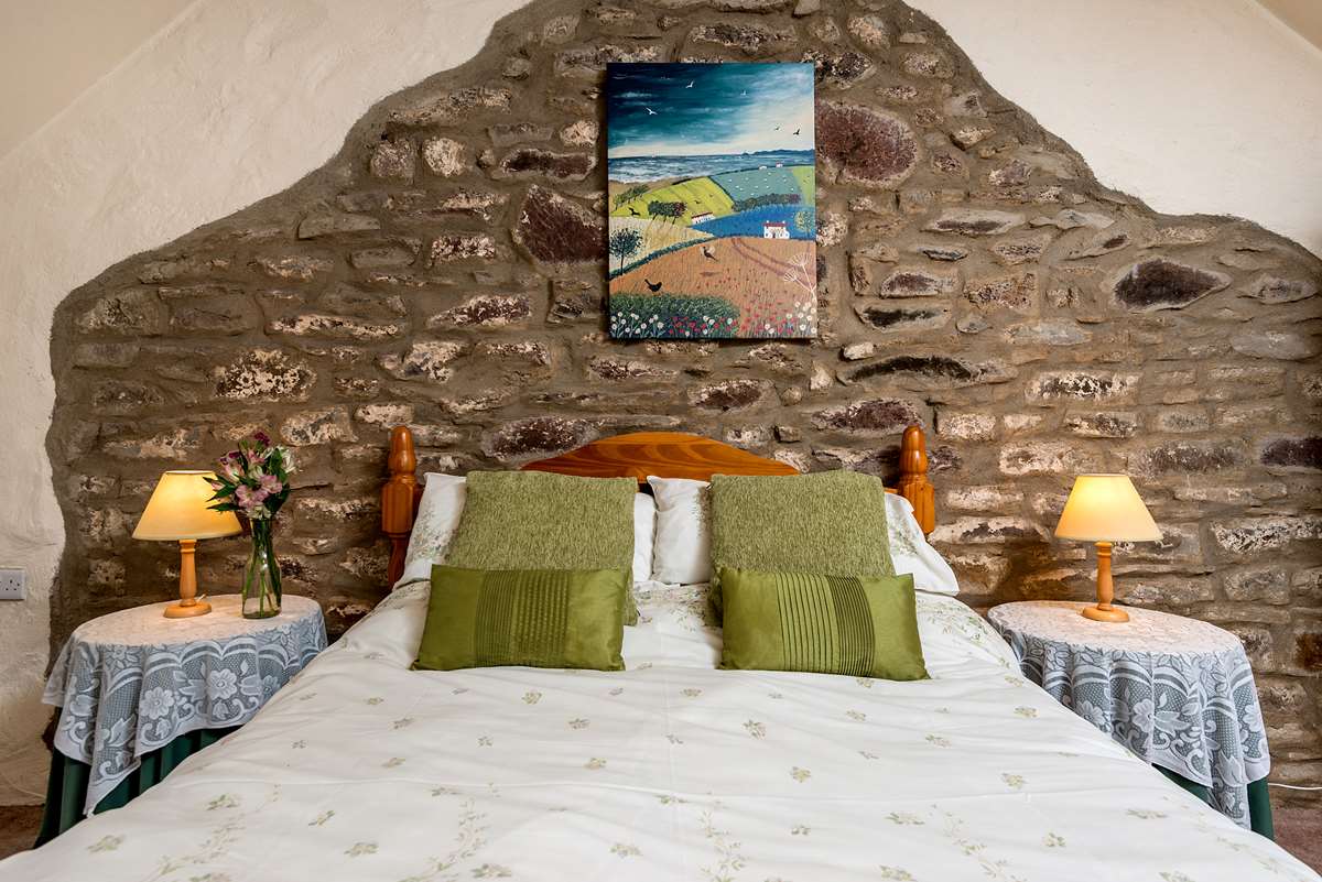 Bedroom at Coachmans Cottage, Upper Hoaten