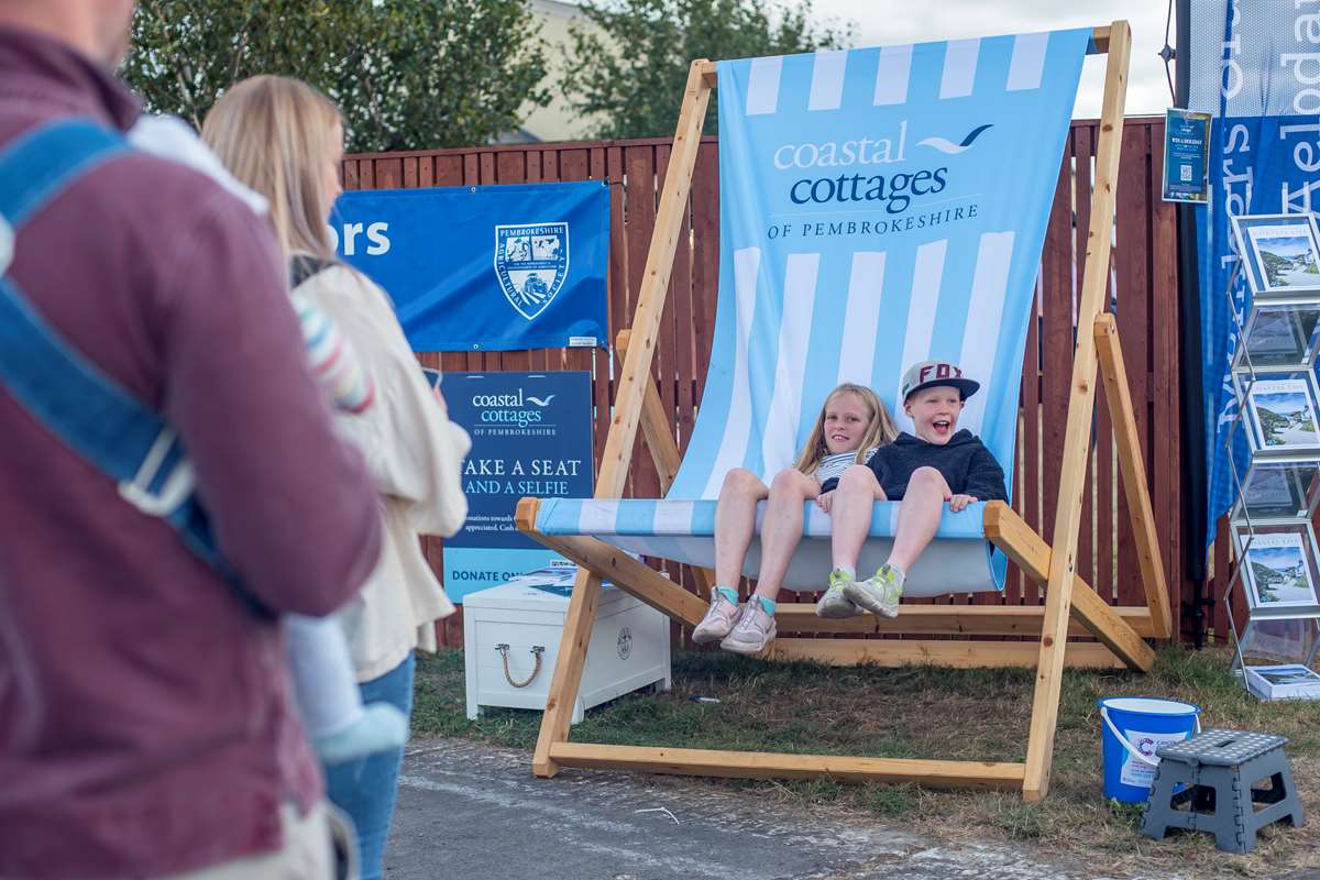 Kids in the Coastal Cottages deckchair