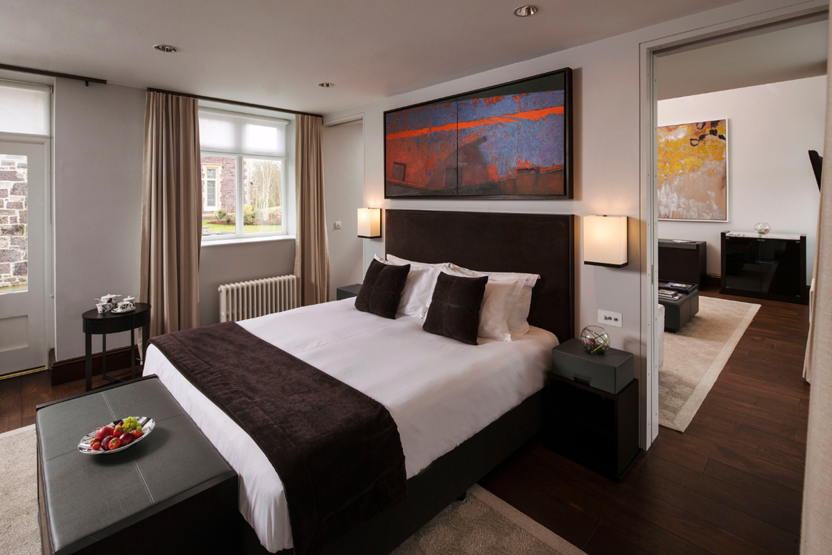 Luxury double bedroom at Penrhiw Priory in Wales