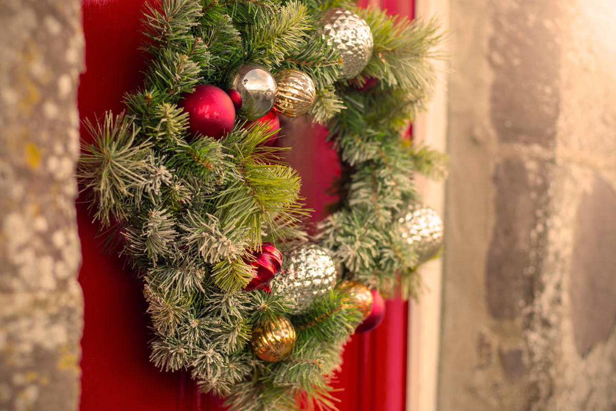 Christmas wreath hanging on a door
